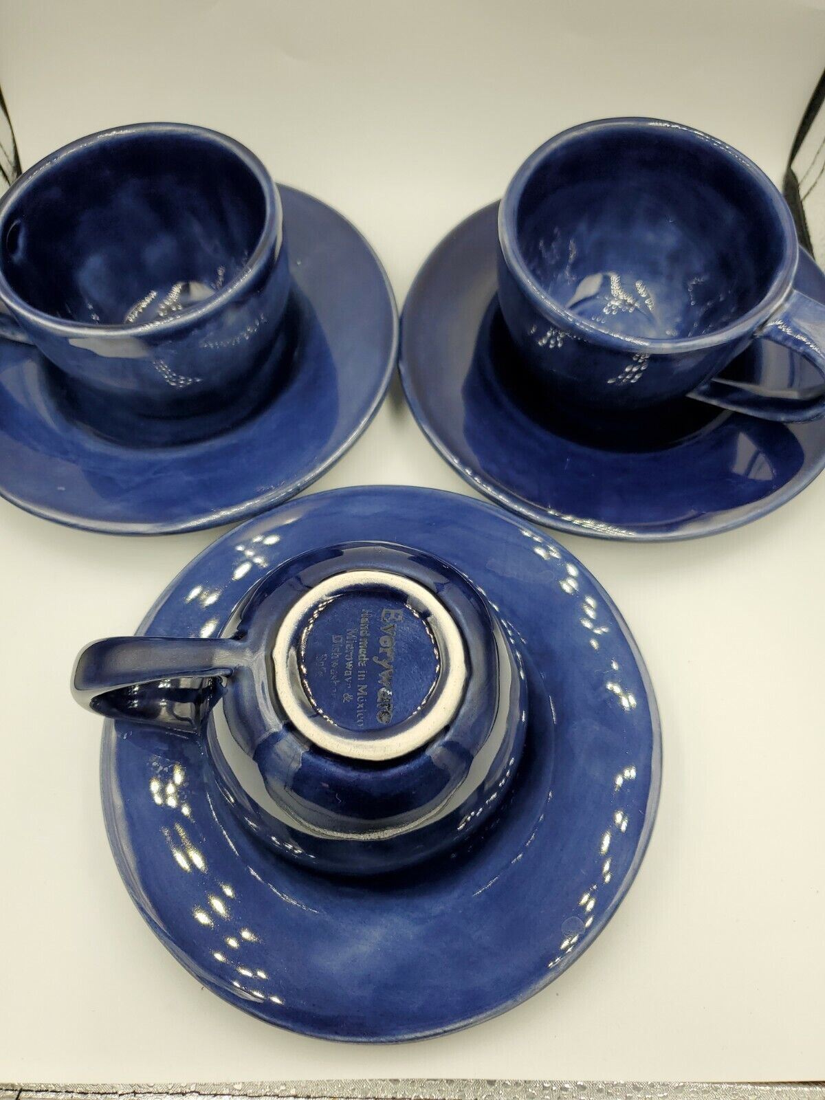 Pottery Barn Handmade pottery  set of four Cup and Saucer Colbalt blue.